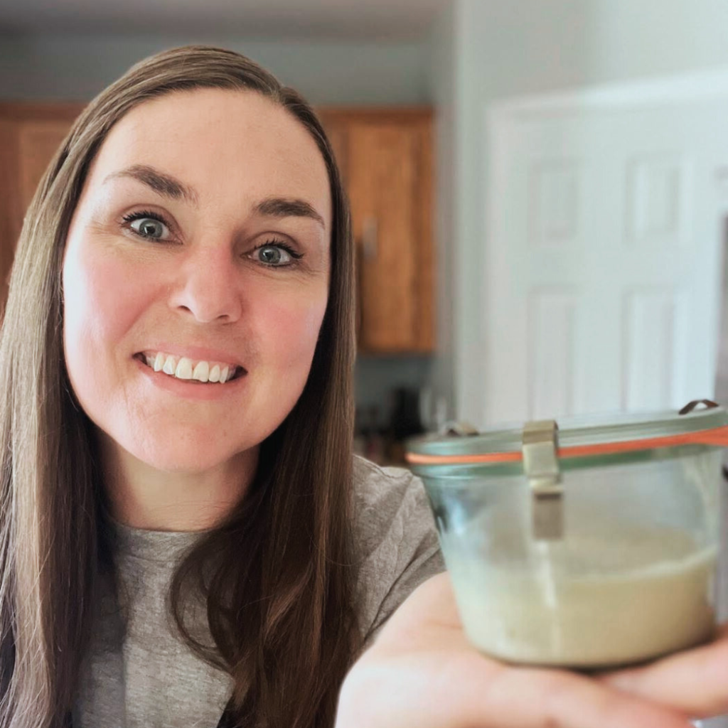 goat and woman on farm